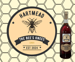 A bee climbing into a Hartmead Bottle